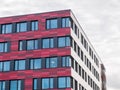 Low Rise Modern Office Building with Red Facade Royalty Free Stock Photo