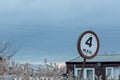 Low rural speed limit sign. 4 M.P.H. slow road speed limit Royalty Free Stock Photo