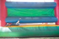 Low section of boy playing on bouncy castle Royalty Free Stock Photo