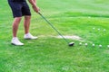 Low section of golf player ready to hit the ball Royalty Free Stock Photo