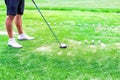 Low section of golf player ready to hit the ball Royalty Free Stock Photo