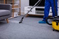 Male Janitor Cleaning Carpet Royalty Free Stock Photo