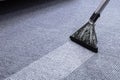 Male Janitor Cleaning Carpet Royalty Free Stock Photo