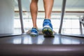 Low section of a man running on treadmill Royalty Free Stock Photo