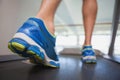 Low section of a man running on treadmill Royalty Free Stock Photo