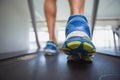 Low section of a man running on treadmill Royalty Free Stock Photo