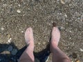 Low Section Of Man Standing On Beach Royalty Free Stock Photo