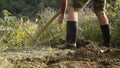 Low section of man working the soil. Farmering concept