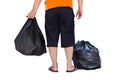 Low section of young man carrying garbage bags Royalty Free Stock Photo