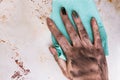 Low-skilled job dirty female hands cleaning