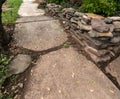 old sidewalk and short stone wall Royalty Free Stock Photo
