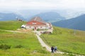 Low Tatras, Slovakia - July, 2018: tourists hiking near tourist house on Chleb mountain in Low Tatras, Slovakia