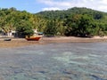 Low tide beach on sunny day at fishermen village Royalty Free Stock Photo