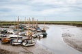 Low tide boats at Blakeney National Nature Reserve