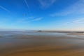 Low tide in front of Mont Saint-Michel abbey. Amazing landmark. Sunny spring morning view. Normandy, France, Europe Royalty Free Stock Photo