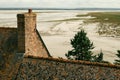 Low tide at Mont St-Michel in summer evening