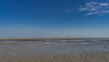 Low tide in the ocean. The sandy bottom was exposed.