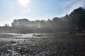 Low Tide Over Muddy Beach with a Heavy Fog Royalty Free Stock Photo