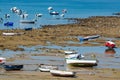 Low tide time on ocean coast of Cadiz, shallow water with fishing boats and seagulls, Andalusia, Spain Royalty Free Stock Photo