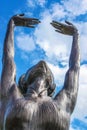 Low view of bronze statue - one of the five Oklahoma Native American ballerinas - The Five Moons -