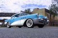 Low view of a classic vintage 1955 blue Buick car