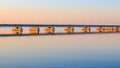 Low water bridge from Sedanka to the De Friz peninsula across the Amur Bay of Primorsky Krai Russia against the background of a Royalty Free Stock Photo