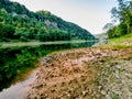 Low water level, empty river inflow. Muddy horrible smell water