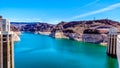 Low water level in Lake Mead and two Intake Towers of the Hoover Dam Royalty Free Stock Photo