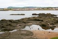 Low water rocks and town houses