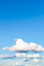 low white clouds in blue sky in summer evening Royalty Free Stock Photo