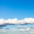 low white clouds in blue sky in summer twilight Royalty Free Stock Photo