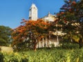 Low wide angle side view to the Clock tower of House of Wonders, Stone Town, Zanzibar Royalty Free Stock Photo