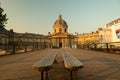 Low wide shot of Pont des Arts and Institut de France in Paris at dawn