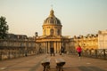 Low wide shot of Pont des Arts and Institut de France in Paris at dawn