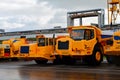 Low yellow dump truck for transportation of rock mass and minerals in underground workings, tunnels and other cramped conditions Royalty Free Stock Photo