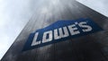 Lowe`s logo on a skyscraper facade reflecting clouds. Editorial 3D rendering`