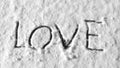 Lowe word on snow romantic handwriting background