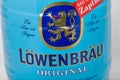 Lowenbrau small barrel of beer can closeup against white Royalty Free Stock Photo