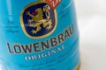 Lowenbrau small barrel of beer can closeup against white Royalty Free Stock Photo