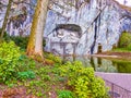 Lowendenkmal or Lion Monument in a rocky cliff in memorial park of Lucerne, Switzerland Royalty Free Stock Photo