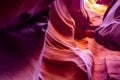 Lower Antelope Canyon in Page Arizona with natural landscapes of water washed bright sandstones stacked in flaky fire waves in a