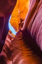 Lower Antelope Canyon`s Wave-curved rock maze with changing light and shadow.