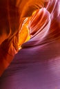 Lower Antelope Canyon`s Wave-curved rock maze with changing light and shadow.