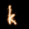 Lower case k letter of alphabet on a black background