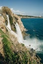 Lower Duden Falls drop off a rocky cliff falling from about 40 m into the Mediterranean Sea, Antalya, turkey Royalty Free Stock Photo