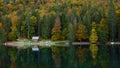 Lower lake of Laghi di Fusine in Autumn colours in Italy