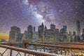 Lower Manhattan from Brooklyn Bridge under a starry night, New York City - USA Royalty Free Stock Photo