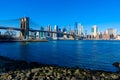 Lower Manhattan Downtown skyline panorama from Brooklyn Bridge Park riverbank, New York City, USA Royalty Free Stock Photo