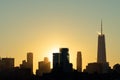 Lower Manhattan Skyline in New York City during Sunset with Silhouettes of Skyscrapers Royalty Free Stock Photo