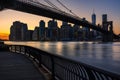 Lower Manhattan skyscrapers and the Brooklyn Bridge at sunset from Brooklyn. Manhattan, New York City